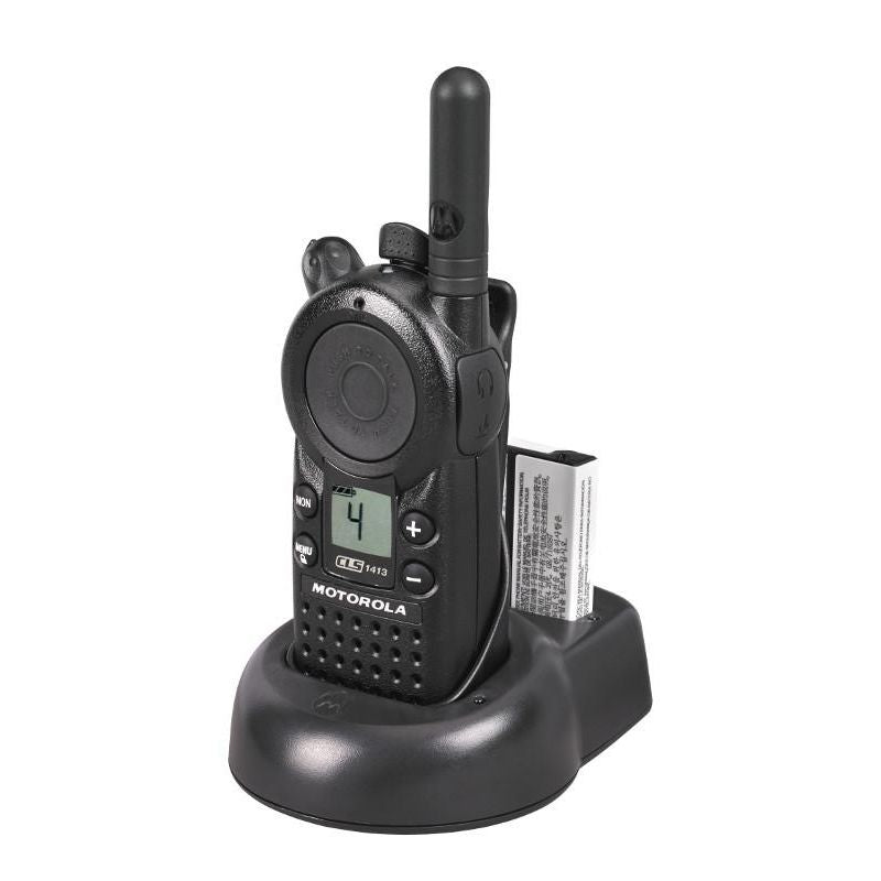 Motorola CLS1413 two-way radio in charger with holster, three-quarter left view